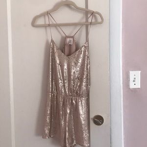 Silvery-gold sparkly romper